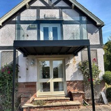 Post-Supported Walkout Balcony with Frameless Glass Balustrade, Malpas, Cheshire
